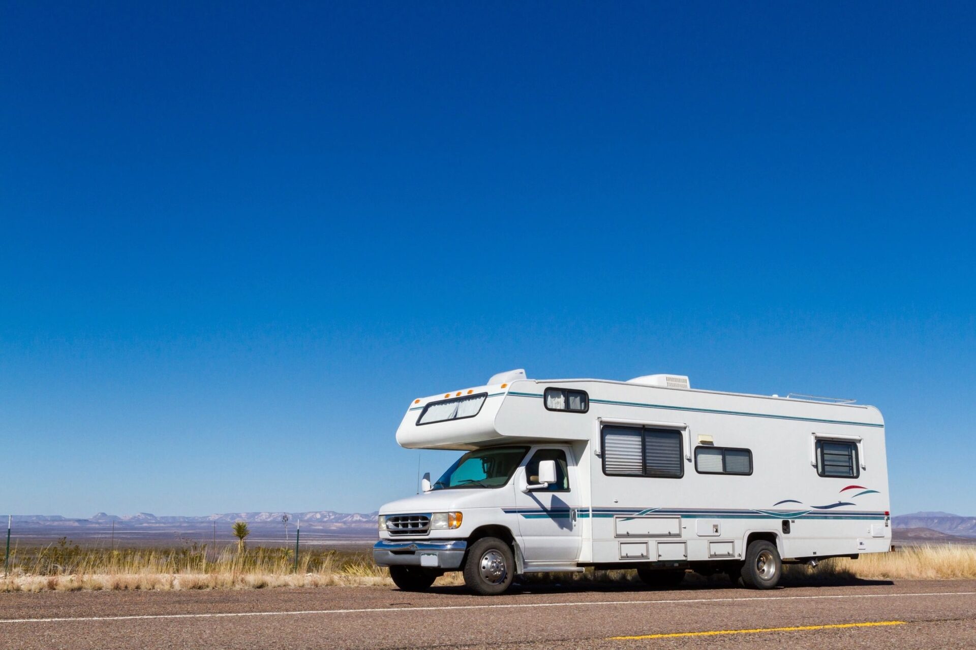 Class C motorohome in the desert.